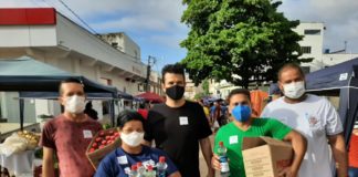 Secretaria de Saúde de Nova Venécia orienta e distribui kits com máscara e álcool gel na Feira Municipal